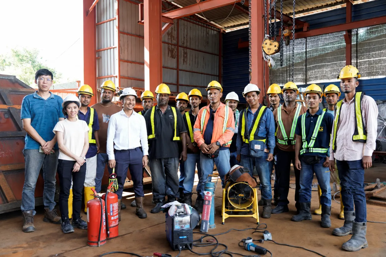 Project team coordinating on a multi-phase site engagement